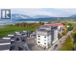 <div class="price">$589,500</div> 131 Harbourfront Drive Ne Unit# 202<br>Salmon Arm, British Columbia<br><div class='bed_bath'>2 Bed | 2 Bath</div>