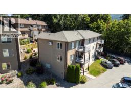 <div class="price">$400,000</div> 1449 1 Avenue Ne Unit# 404<br>Salmon Arm, British Columbia<br><div class='bed_bath'>2 Bed | 2 Bath</div>